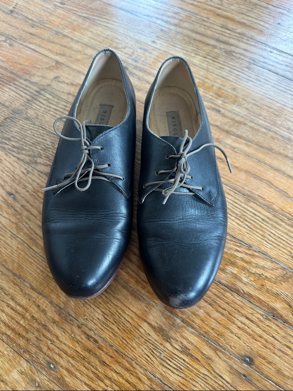 Nisolo Black Leather Derby Shoes with Tan Laces